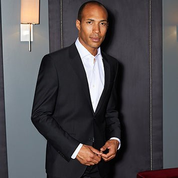 navy suit black tie funeral