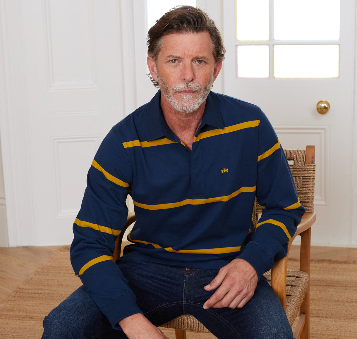 Men's blue and gold striped rugby shirt