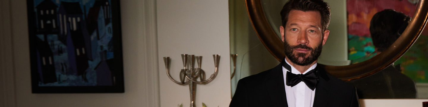 Black tie suit, shirt and bow tie