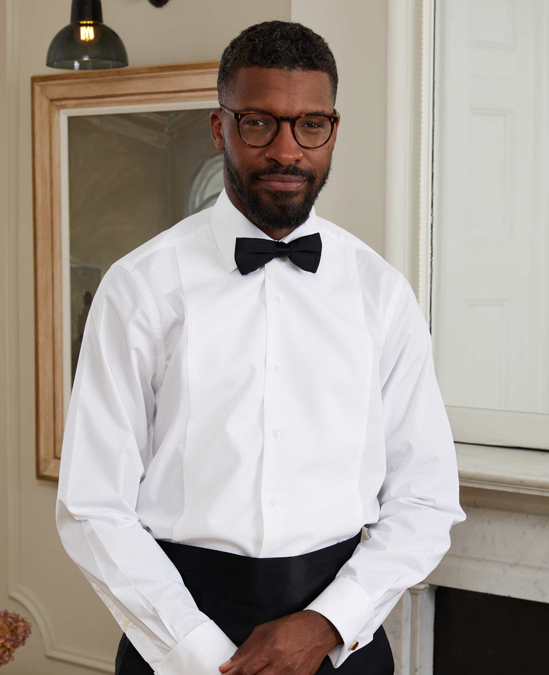 White tuxedo shirt with black bow tie