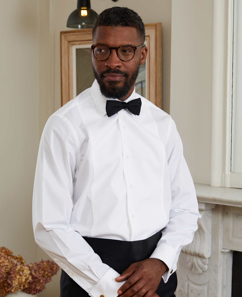 Black tie outfit, white shirt and black bow tie