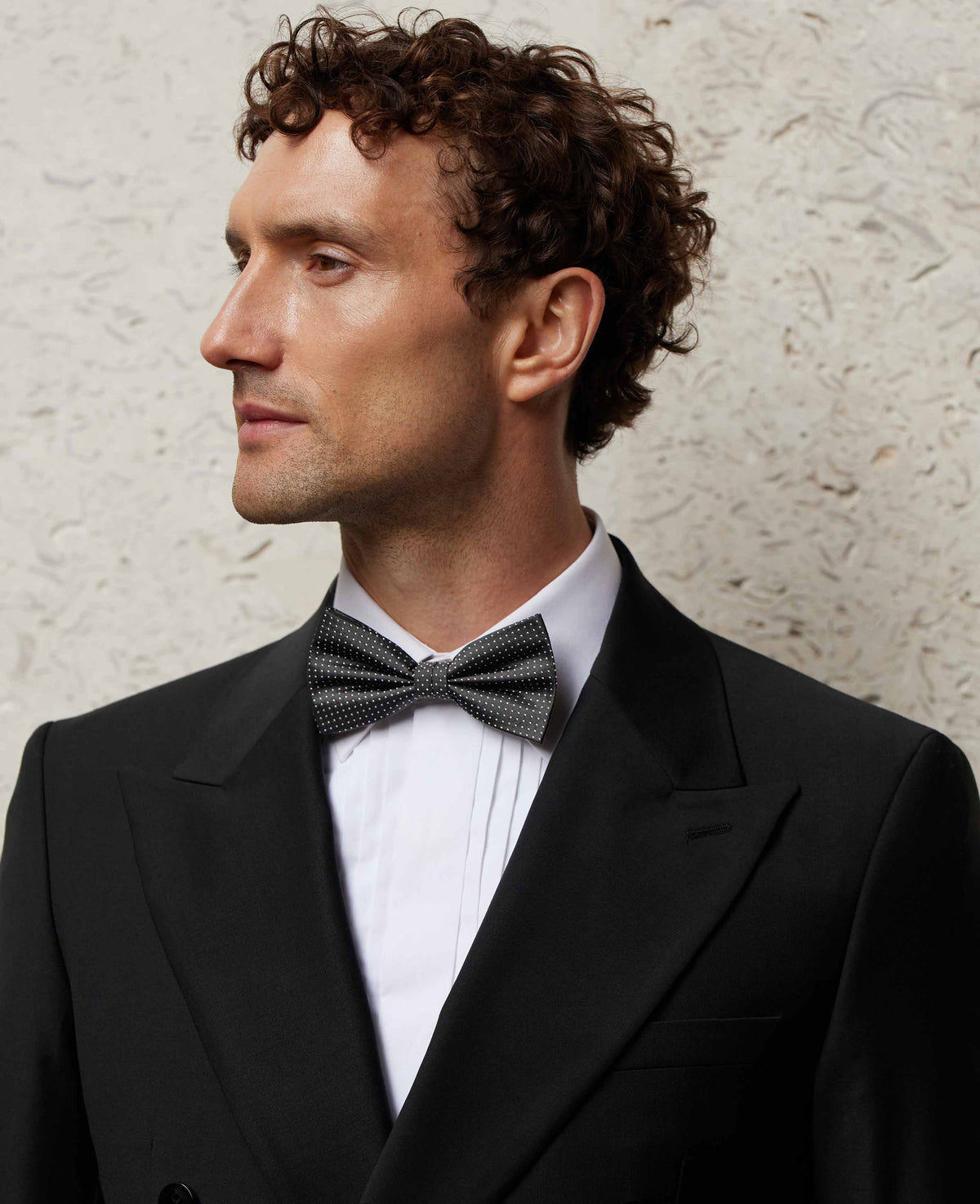 Men's Black Silk Pinspot Ready Bow Tie & Cufflink Set model shot