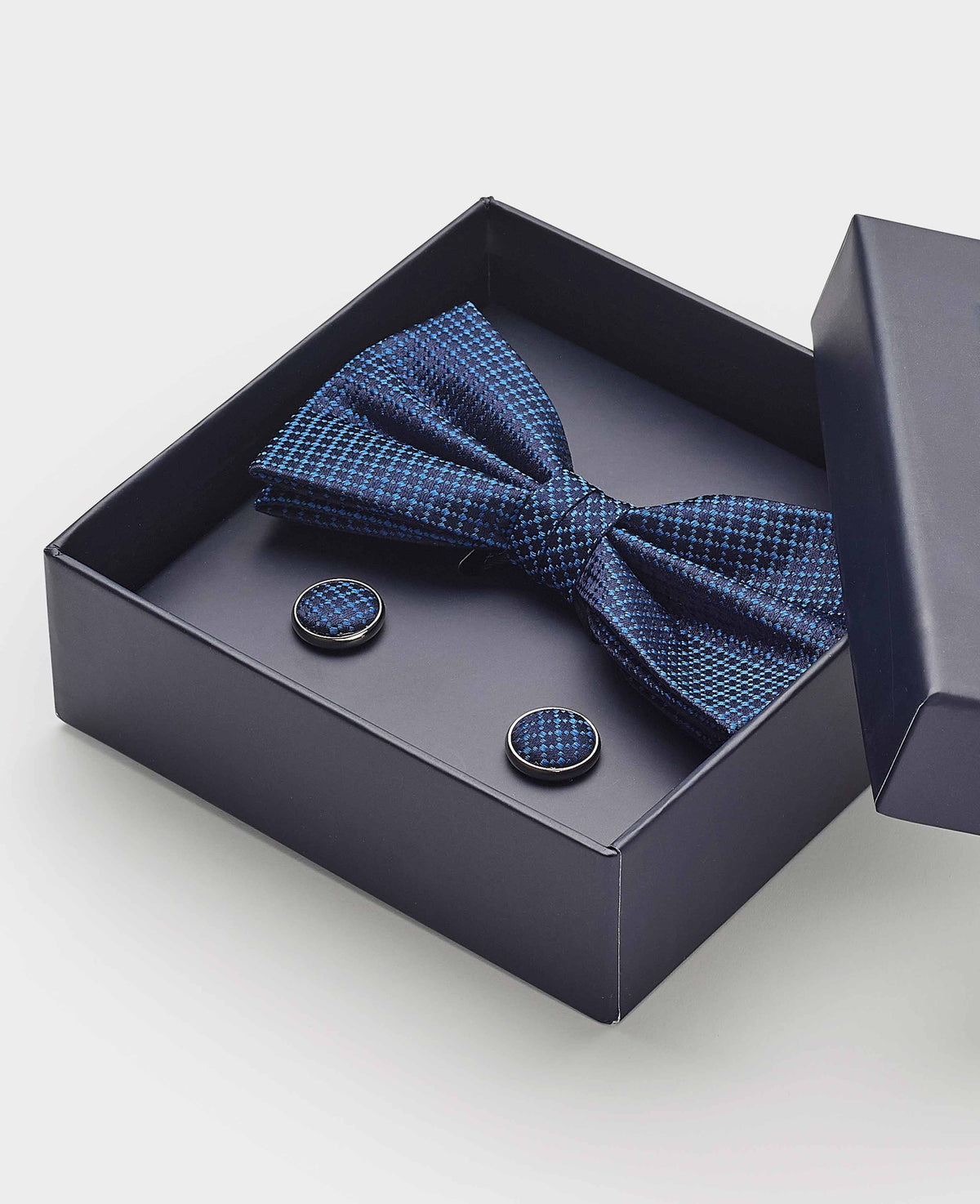 Men's Blue Silk Abstract Self Bow Tie & Cufflink Set close up