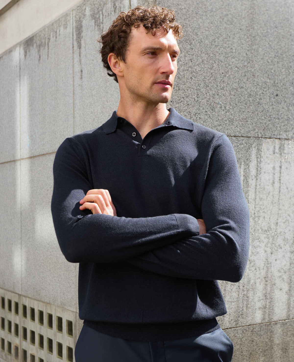 Men's Navy Merino Wool Knitted Polo Shirt model shot