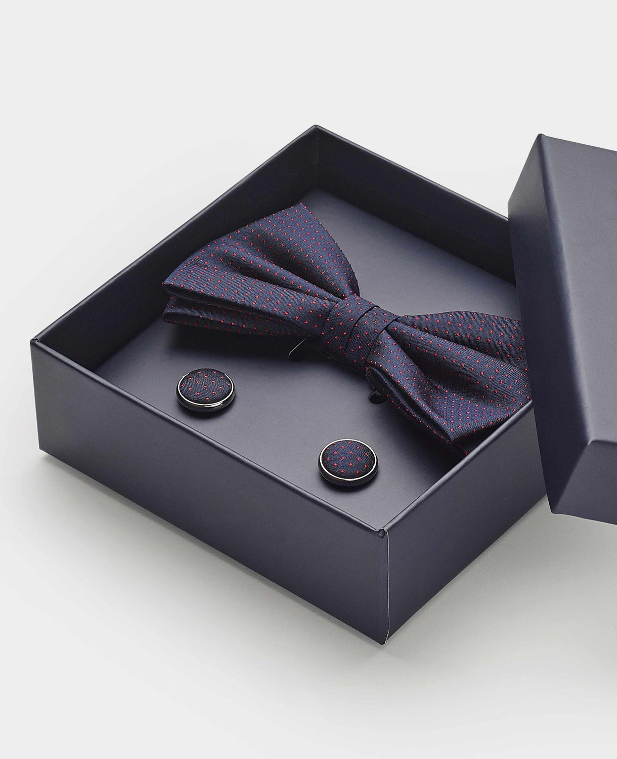 Men's Navy Silk Pinspot Self Bow Tie & Cufflink Set close up