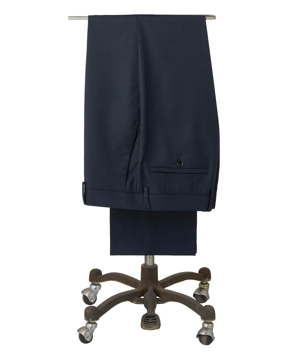 Men's Navy Wool Blend Suit Trousers folded on rails