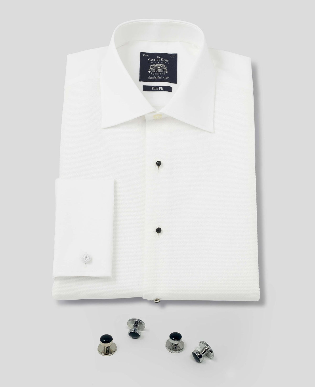 Men's White Marcella Bib Front Dinner Shirt & Dress Stud Set folded with studs