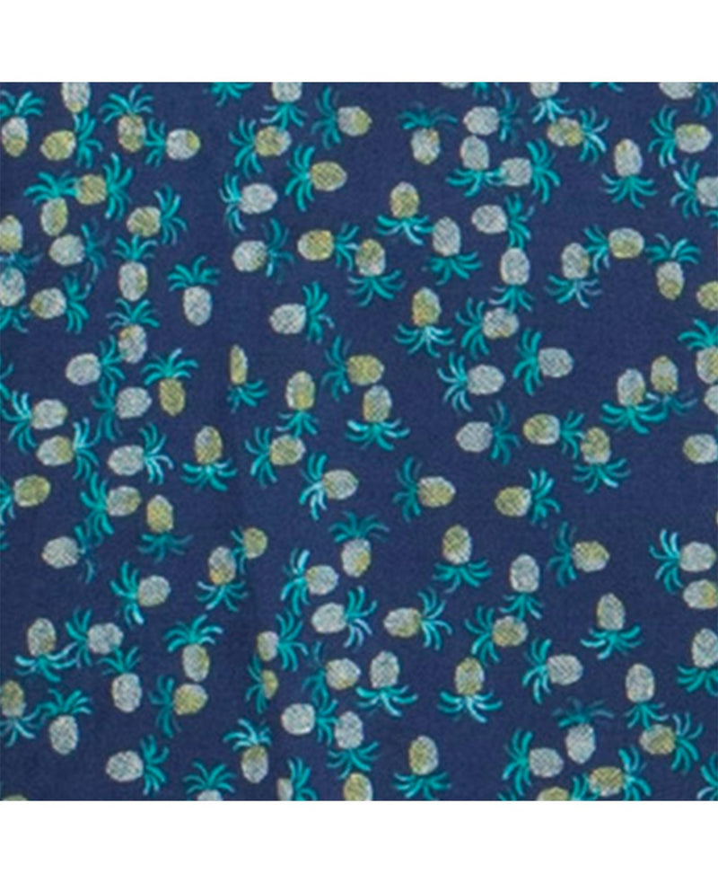 Pattern of pineapples on a blue background