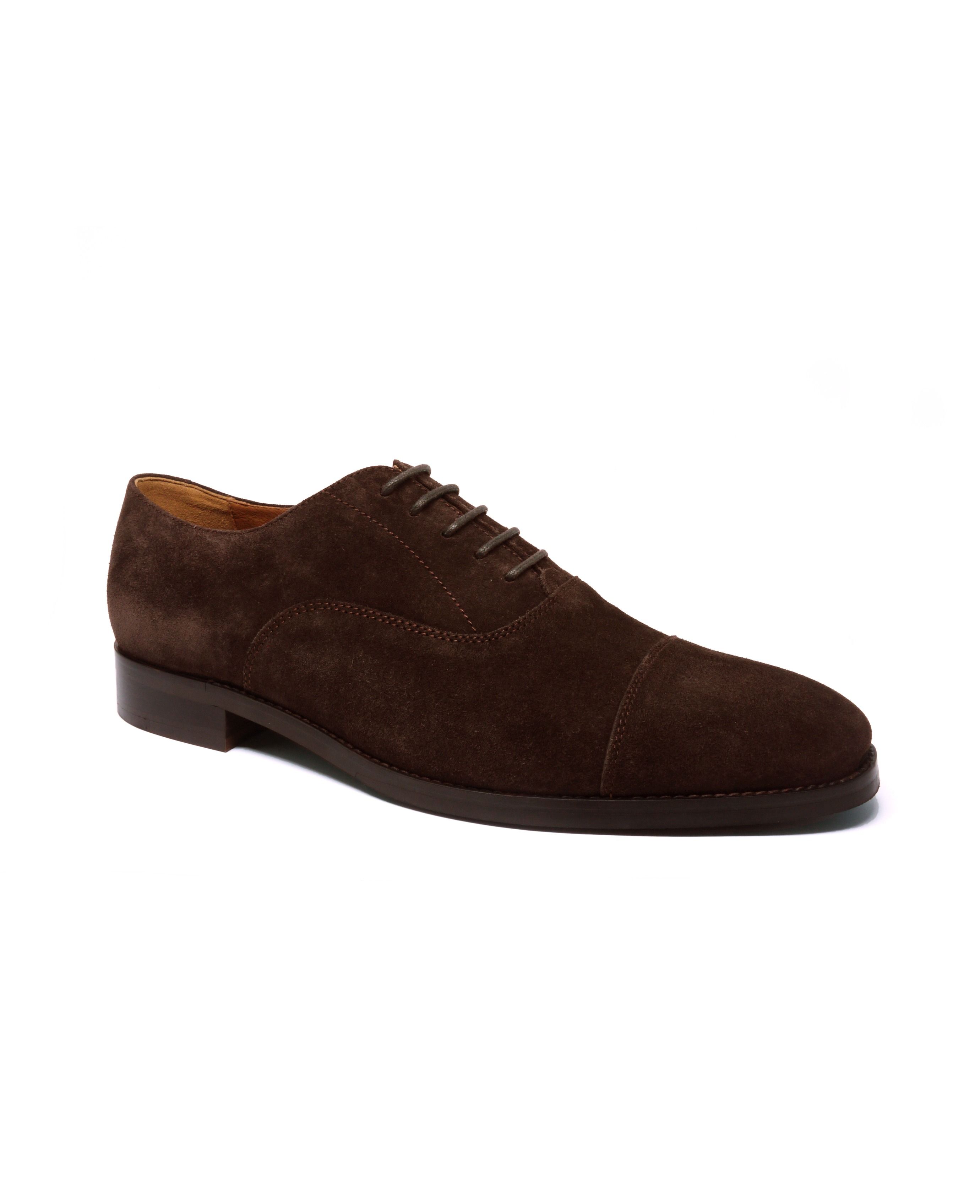A pair of brown suede derby shoes, blue jeans, leather belt with grey tweed  blazer. Casual business outlook. Top view. Stock Photo | Adobe Stock