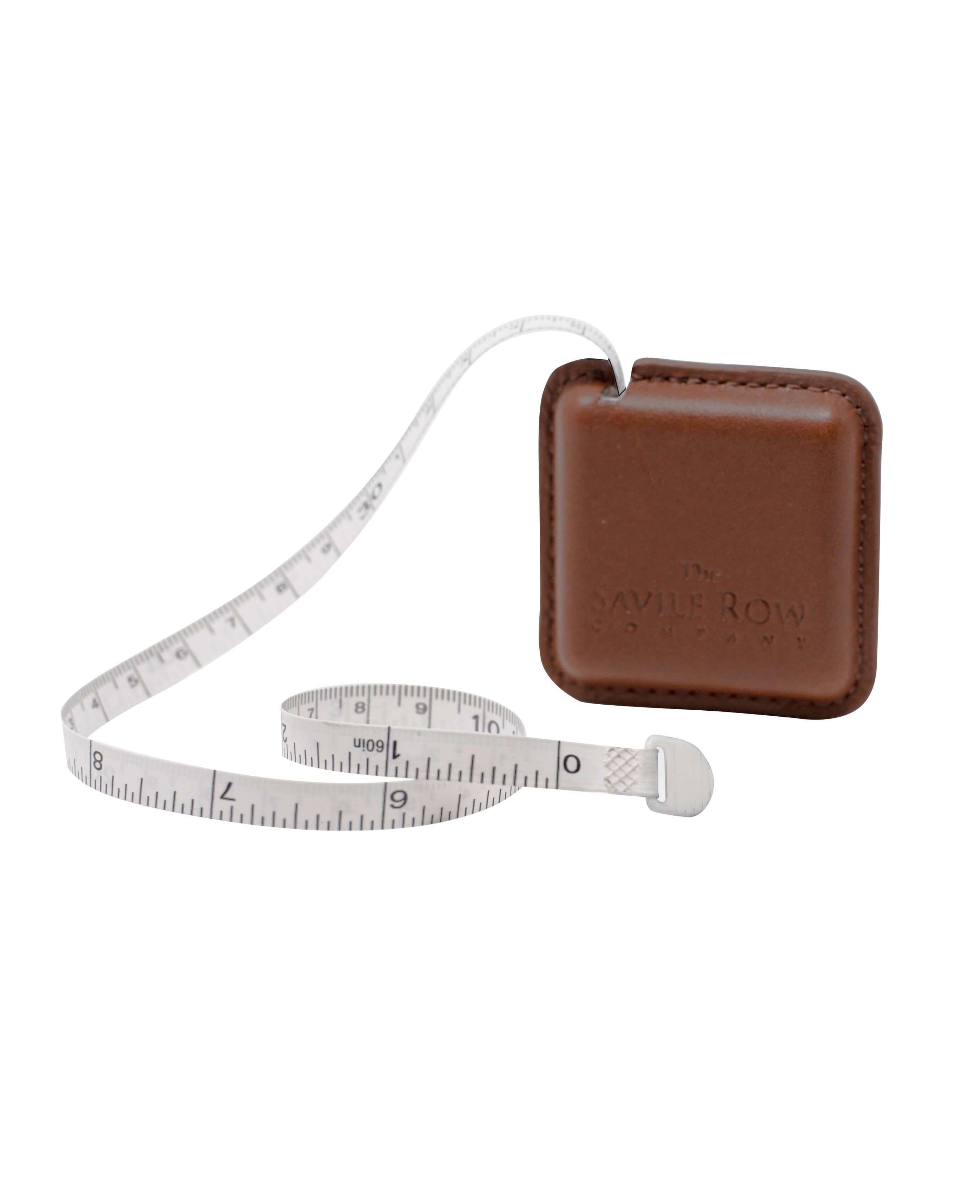 https://savilerowco.com/media/catalog/product/cache/2accacfcf7bc449eee367fe2319d84b6/t/a/tan-leather-tape-measure-out-mlg1030tan.jpg